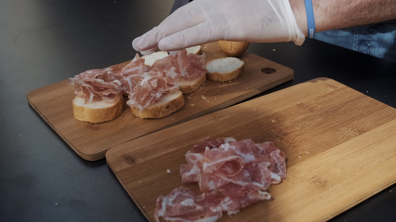 Preparing prosciutto sandwiches