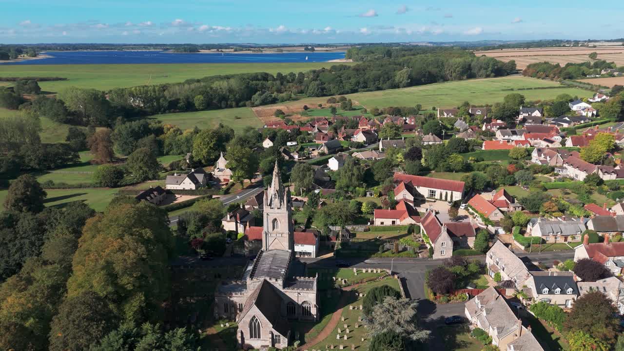 Aerial view of St Peter's Church in Empingham village landscape
