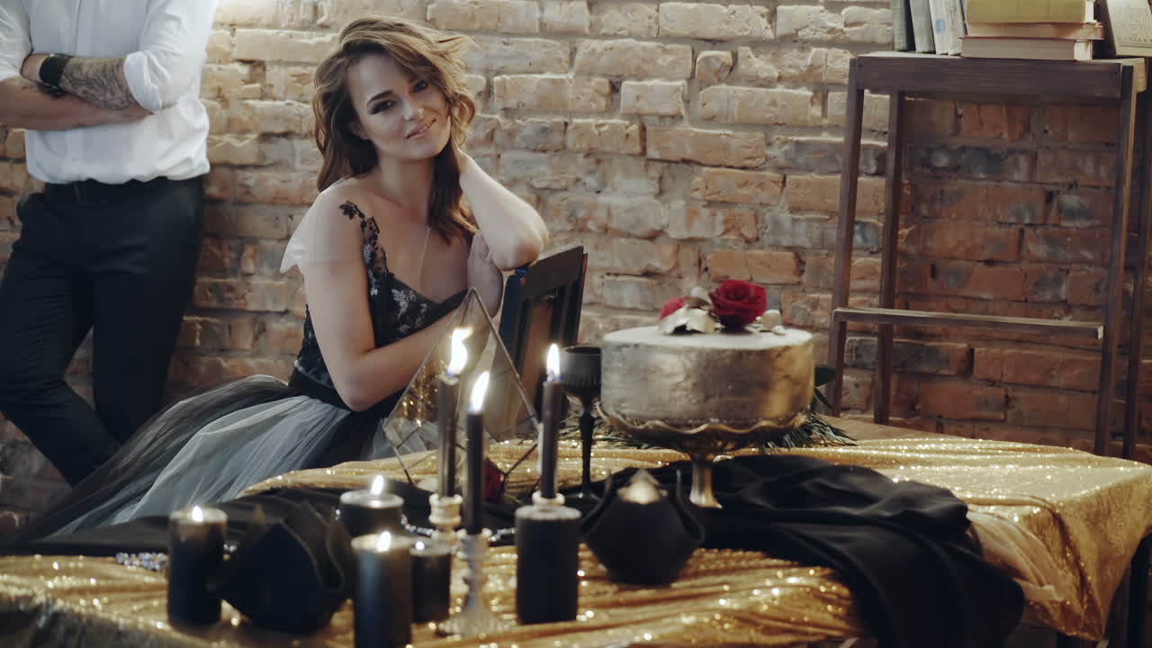 Couple in evening outfits. Couple dating and sitting at table in a restaurant