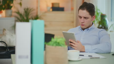 Concentrated-Man-Browses-Internet