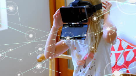 animation of communication network over caucasian girl using vr headset at home