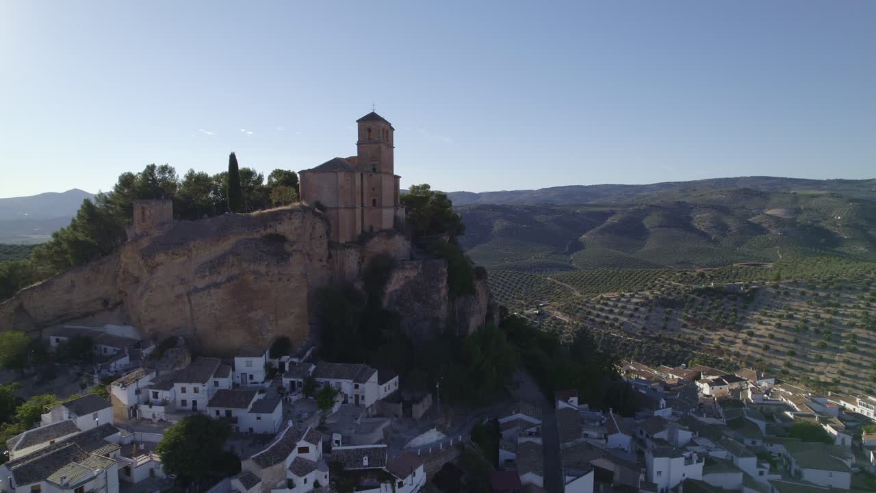Montefrio. Village Church. Iglesia de la Villa. Church next to cliff. Aerial view of Andalusian town and church on cliff. Montefrio. Andalusia. Spain.