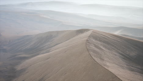 red sand desert dunes in fog