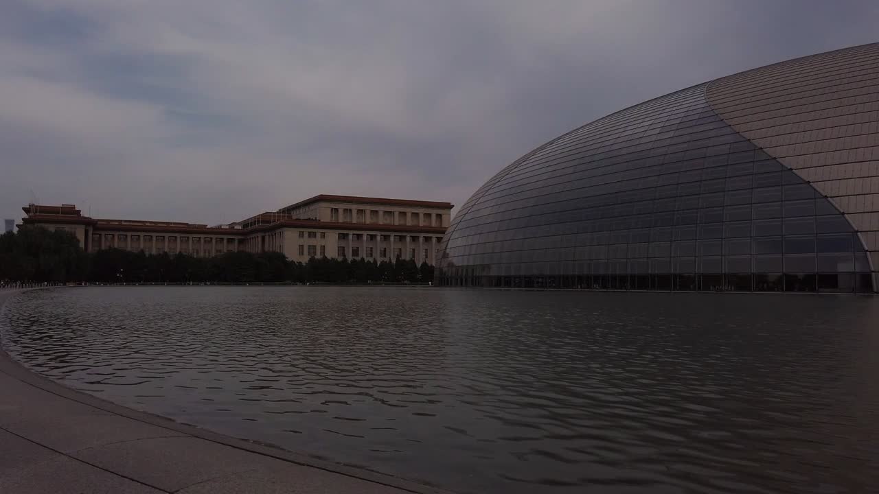 View of the National Centre for the Performing Arts (NCPA), colloquially described as "The Giant Egg", and The Great Hall of the People in the background.