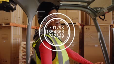 animation of changing numbers in circles over smiling biracial woman driving forklift in warehouse