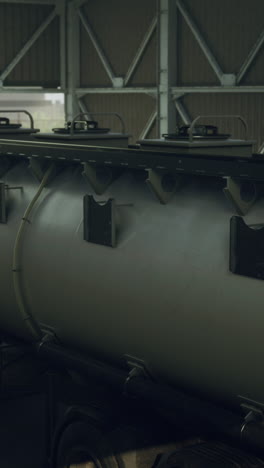 close-up shot of a large tanker truck with a stainless steel tank trailer