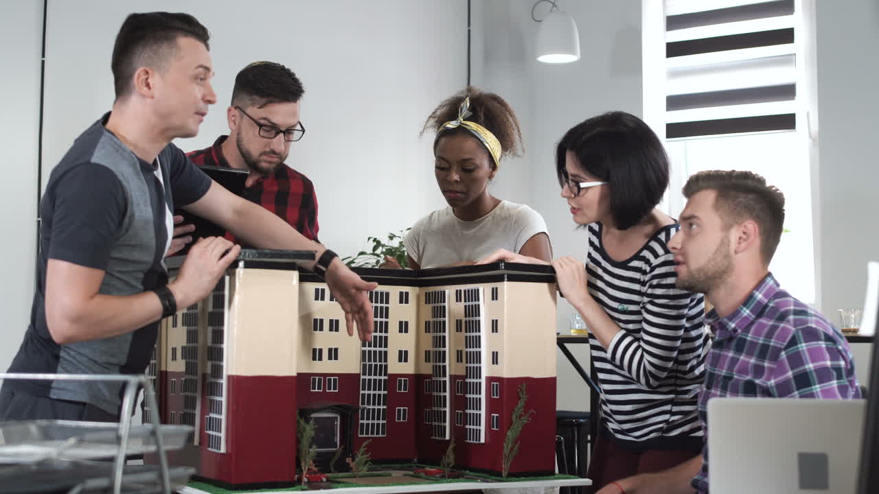 Team discussing building model