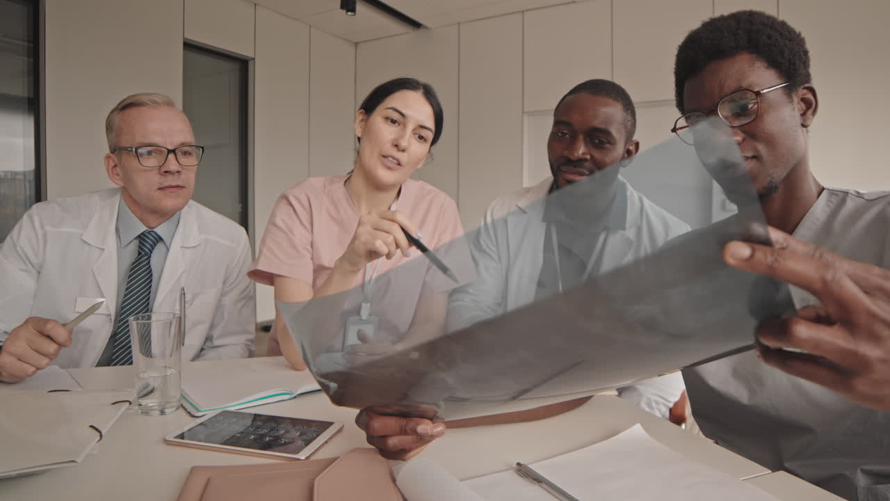 Medical Professionals Analyzing X-Ray