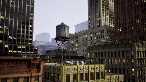 historic water tower stands amidst urban skyline at dusk in a busy city