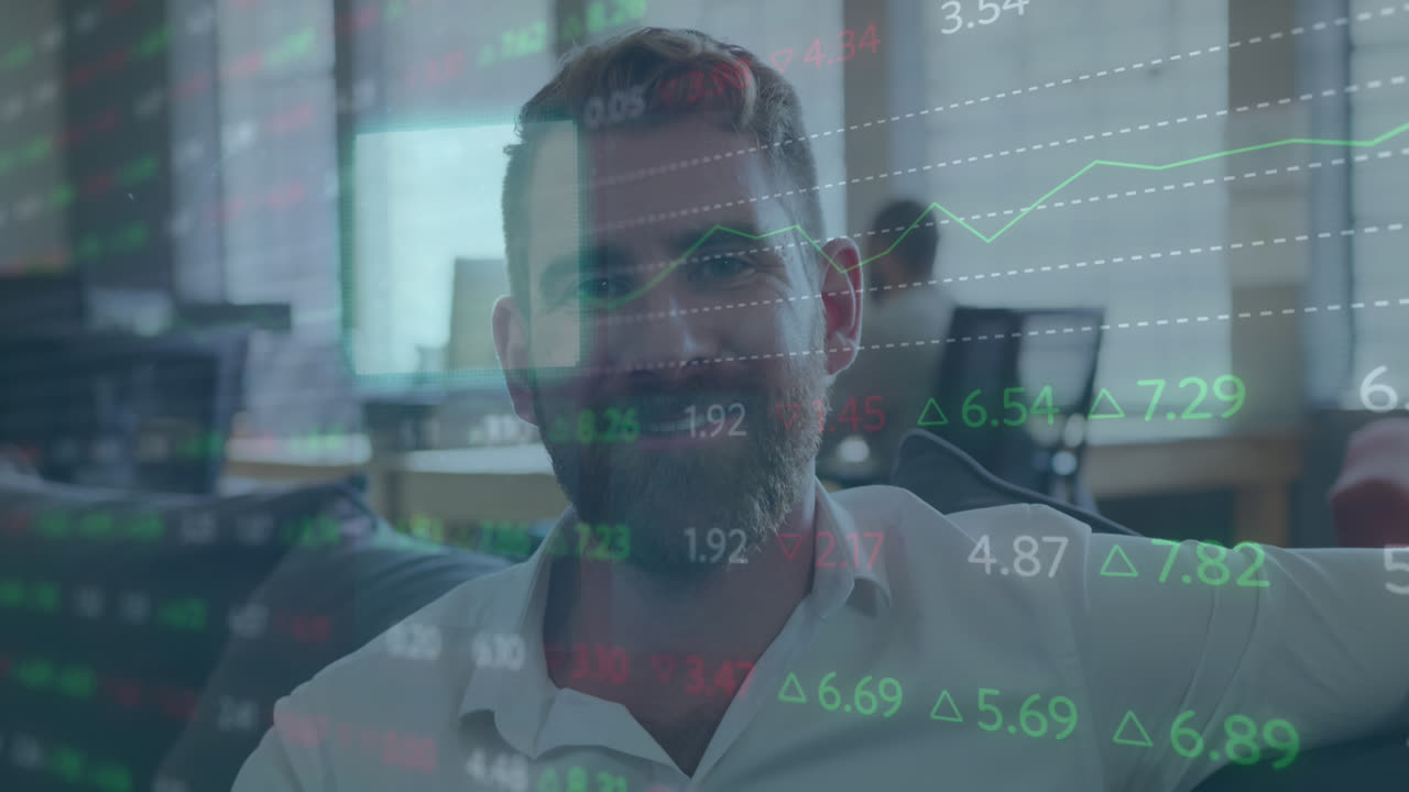 Animation of stock market data processing and sqaure shapes over caucasian man smiling at office