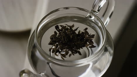 tea infusion in a glass teapot