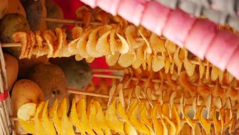 crispy spiral cut potato chips on sticks