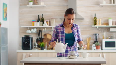 Pouring-hot-water-in-teacup