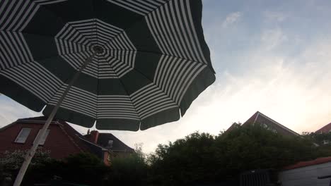 Slow-wind-blowing-a-umbrella-terrace