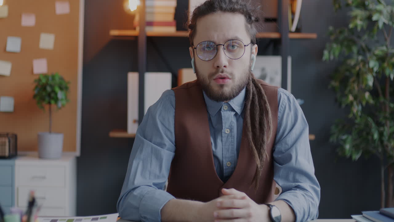 Man on a video call in office