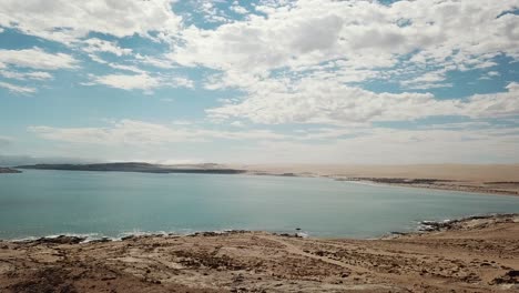 the namib desert dunes and the atlantic ocean meets, skeleton coast, southern africa namibia, luderitz town shark island aerial shot