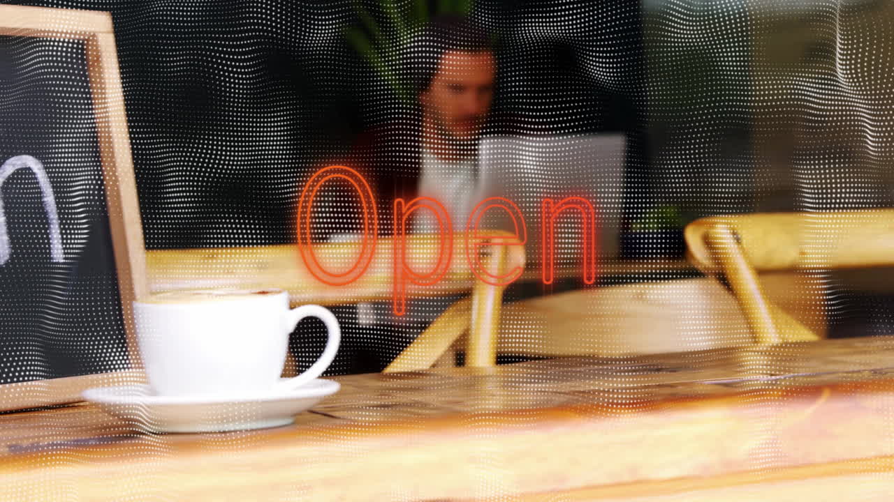 Man working on marketing data using laptop in cafe, with floating chart overlays, neon sign glow