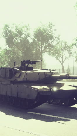military tank parked on a street in a quiet urban area during daylight