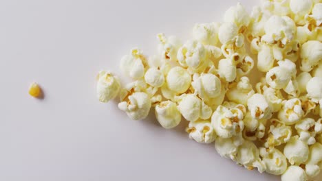 video of close up of popcorn on white background