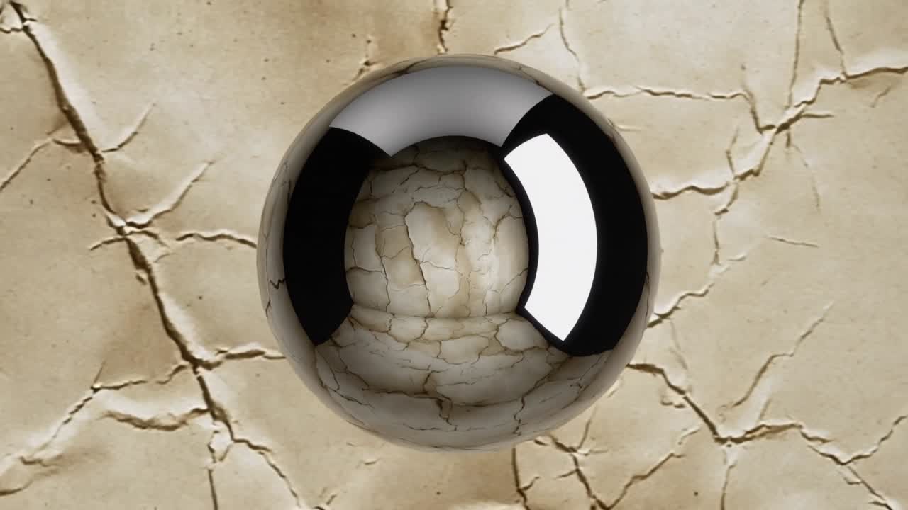 Reflecting metallic sphere showing softbox moving, shifting highlight on cracked surface for study
