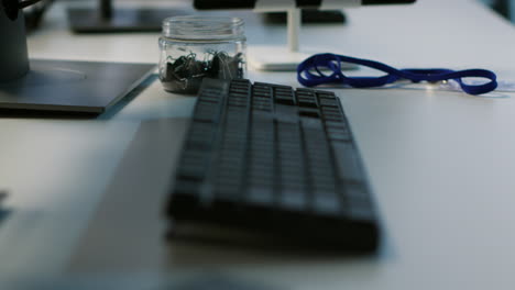 modern office workspace with computers and peripherals