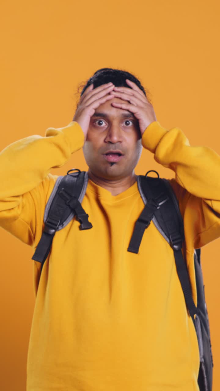 Surprised Delivery Man Holding Stack of Pizza Boxes