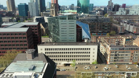 Modern-Building-Exteriors-In-Rotterdam,-Netherlands-With-World-Trade-Center-In-Background