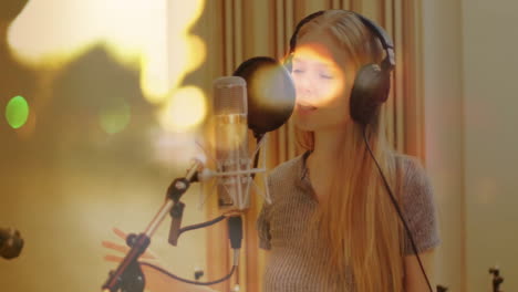 female vocalist singing in music studio, with headphones and sound waves pulsing around microphone