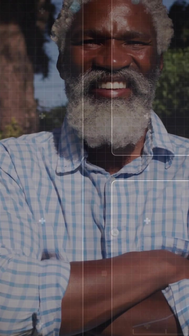 Small wrist movement initiating reveal, Black man checking smartwatch, smiling, UI overlays showing