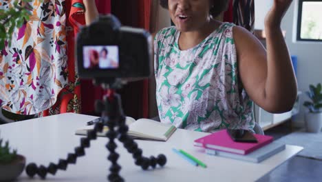 African-american-female-plus-size-vlogger-recording-a-video-about-fashion