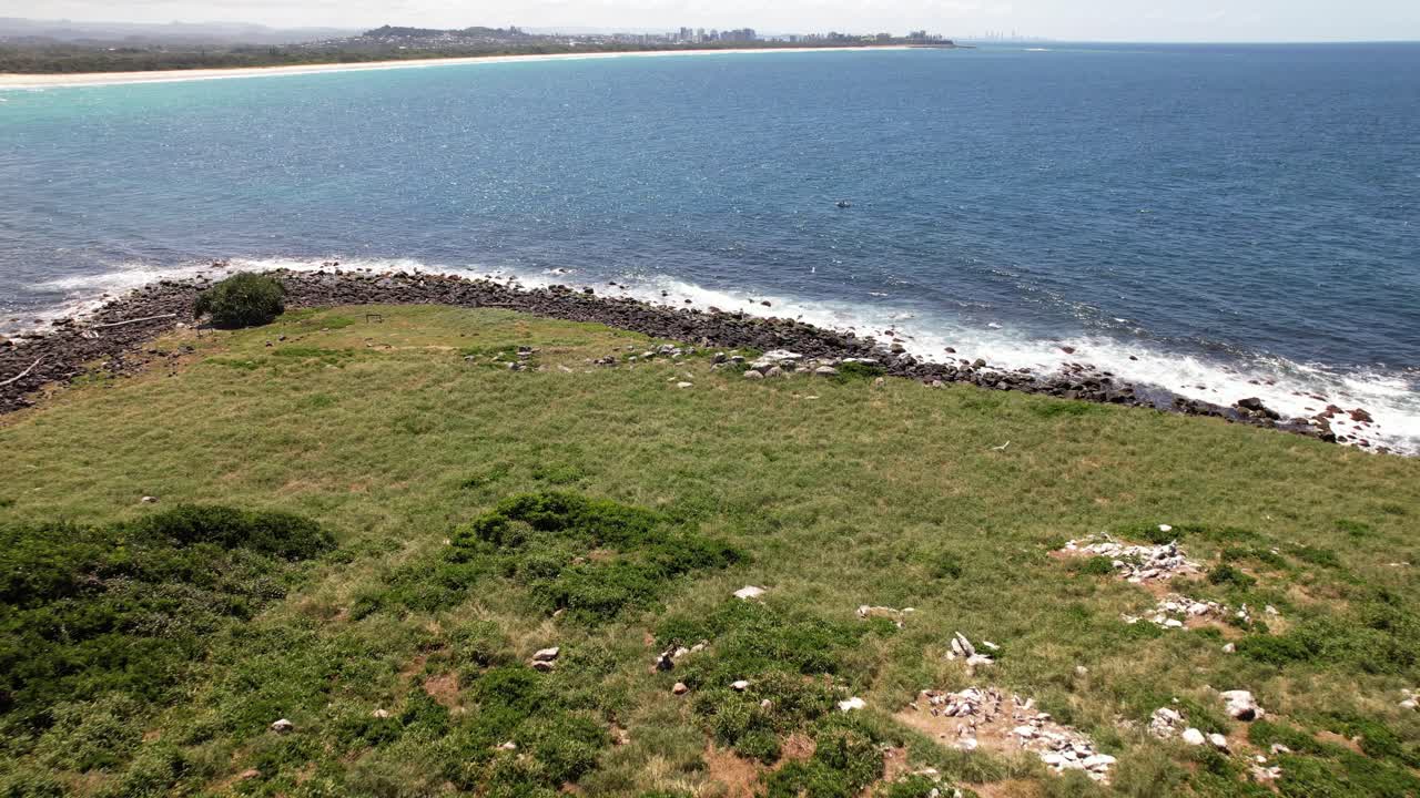 Seascape And Rocky Shore Of Cook Island In NSW, Australia - Drone Shot