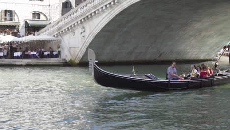 family sailling in gondola, venice, slow motion