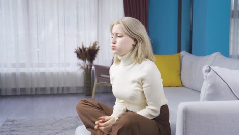 unhappy, depressed woman thoughtful and not feeling well.