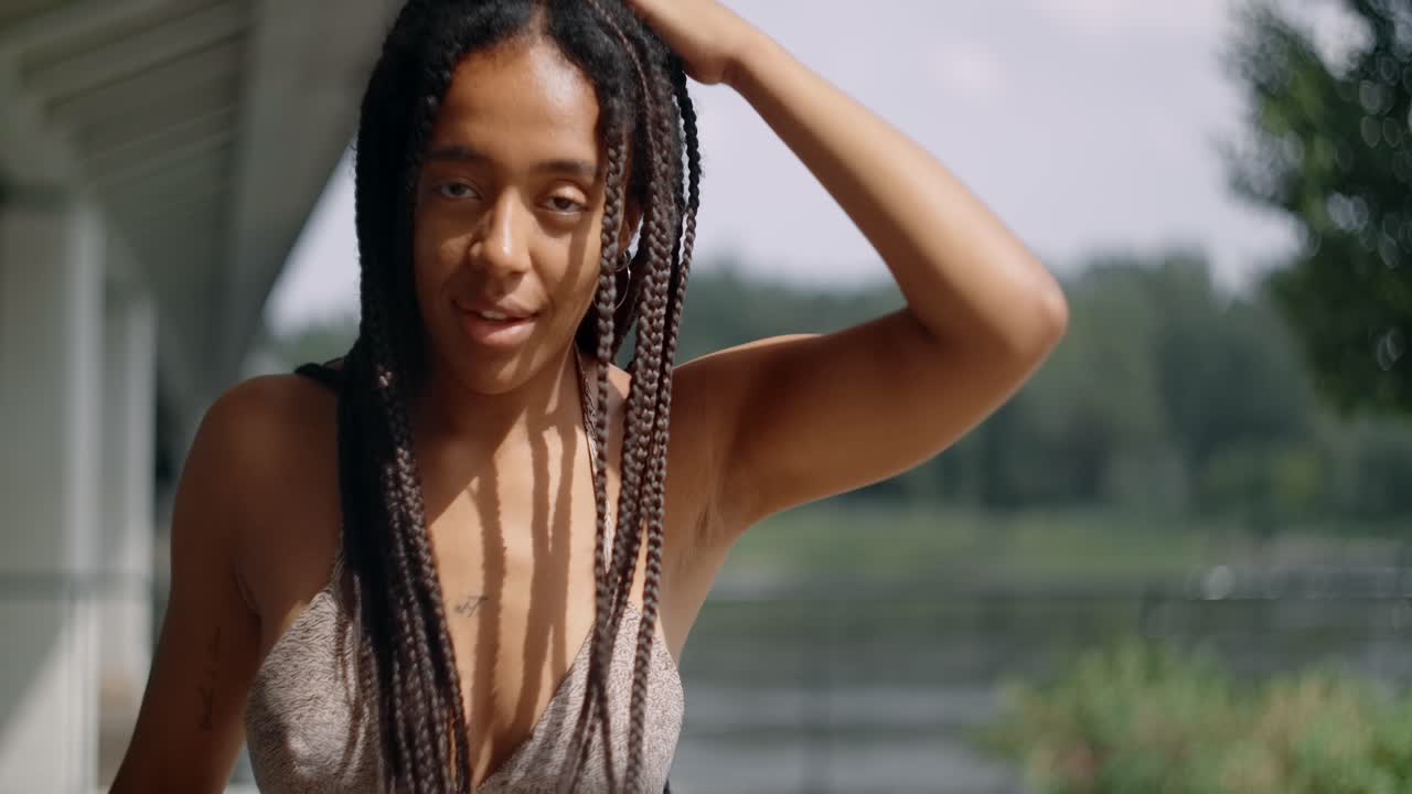 Woman with braids in a park
