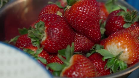 Close-up-of-strawberries-in-a-bowl-in-a-chef's-kitchen