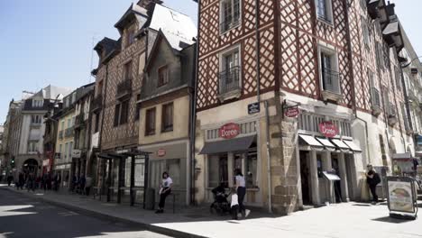 charming french town street scene with historic buildings