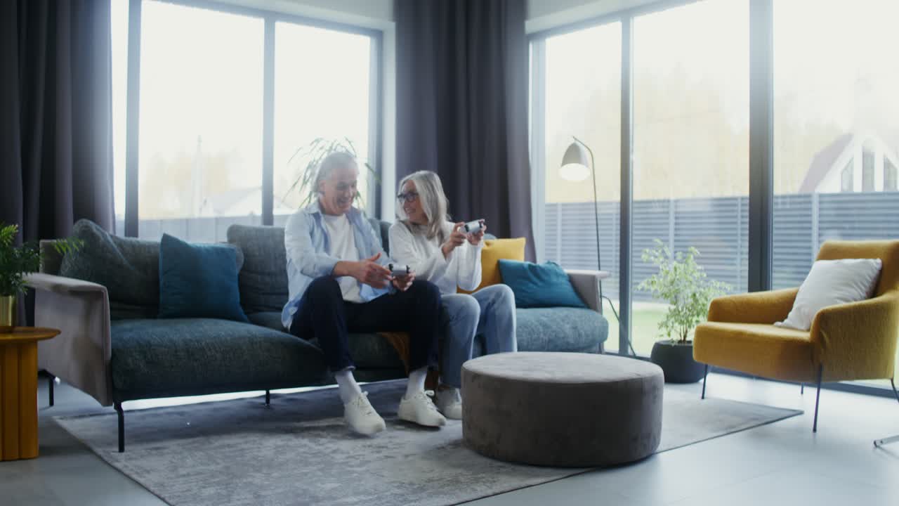 Senior Couple Enjoying Video Games at Home