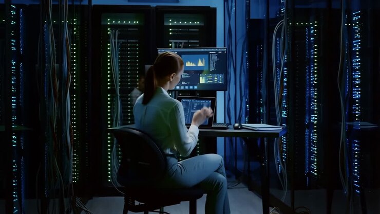 Woman working in a data center