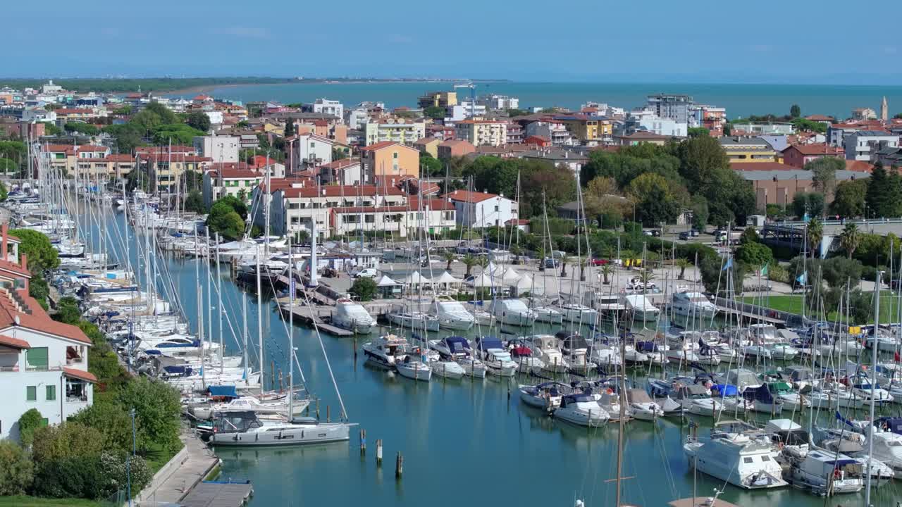 beautiful yachts and motorboats of Darsena dell'Orologio in Caorle, the Metropolitan City of Venice, Italy