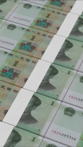 vertical video of 1 chinese renminbi banknotes printing by a money press