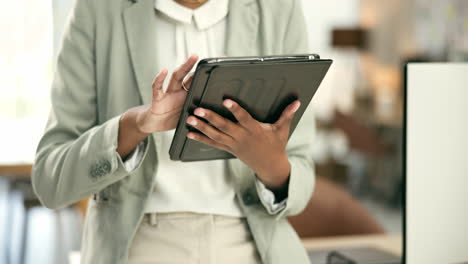 businesswoman using a tablet in an office setting