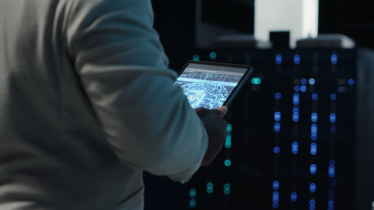 Vertical video System administrator walking in data center with modern supercomputers units