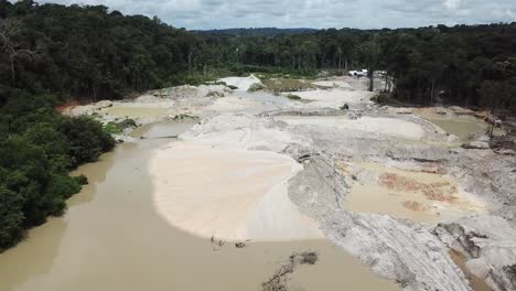 mineral digging area in amazon, illegal gold mining, birds eye view