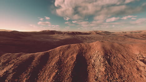 sunset over the sand dunes in the desert