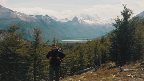 a man over monte fitz roy hiking trails at summer in patagonia, argentina, south america