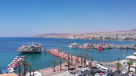 aerial drone footage of eilat's port and marina, red sea, israel