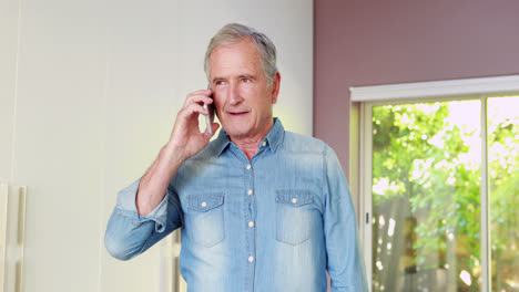 Senior-man-using-his-smart-phone