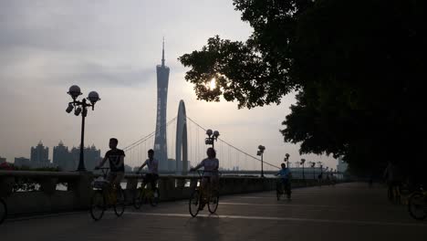 sunset time guangzhou city famous bridge canton tower riverside slow motion panorama 4k china