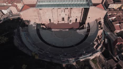 slow revealing shot of the world-famous orange theatre inspired by the romans