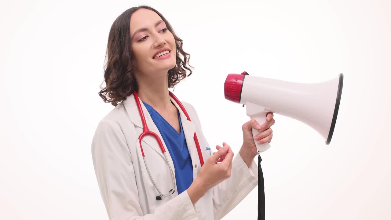 A female doctor using a megaphone to make an announcement